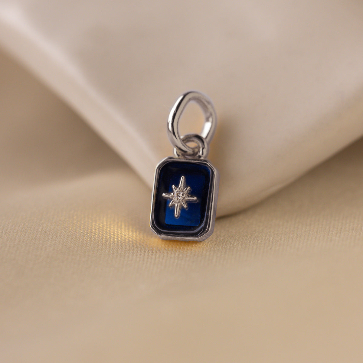 North Star Sapphire Charm