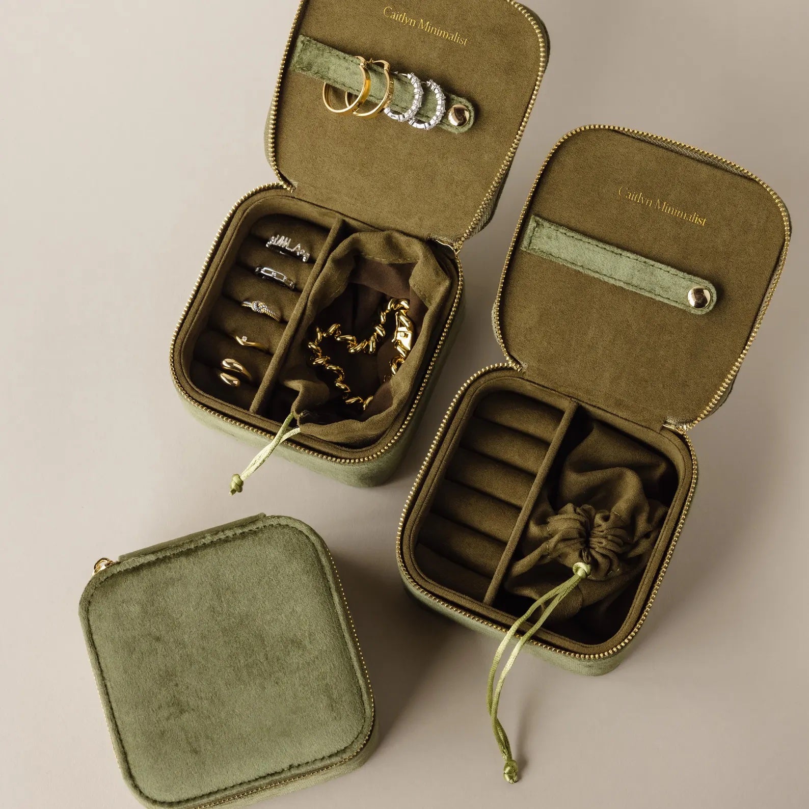 The Green Velvet Jewelry Box, available in sets with one closed and two open boxes, provides stylish storage for rings, bracelets, and earrings—ideal as a travel jewelry box to keep your valuables organized anywhere.