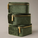 Three Green Velvet Jewelry Boxes, ideal for storing jewelry or using as compact travel cases, are stacked together against a neutral background.