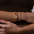 Close up of a model's wrist wearing our Duo Chain Diamond Timepiece watch, styled with our S-Link Diamond Tennis Bracelet