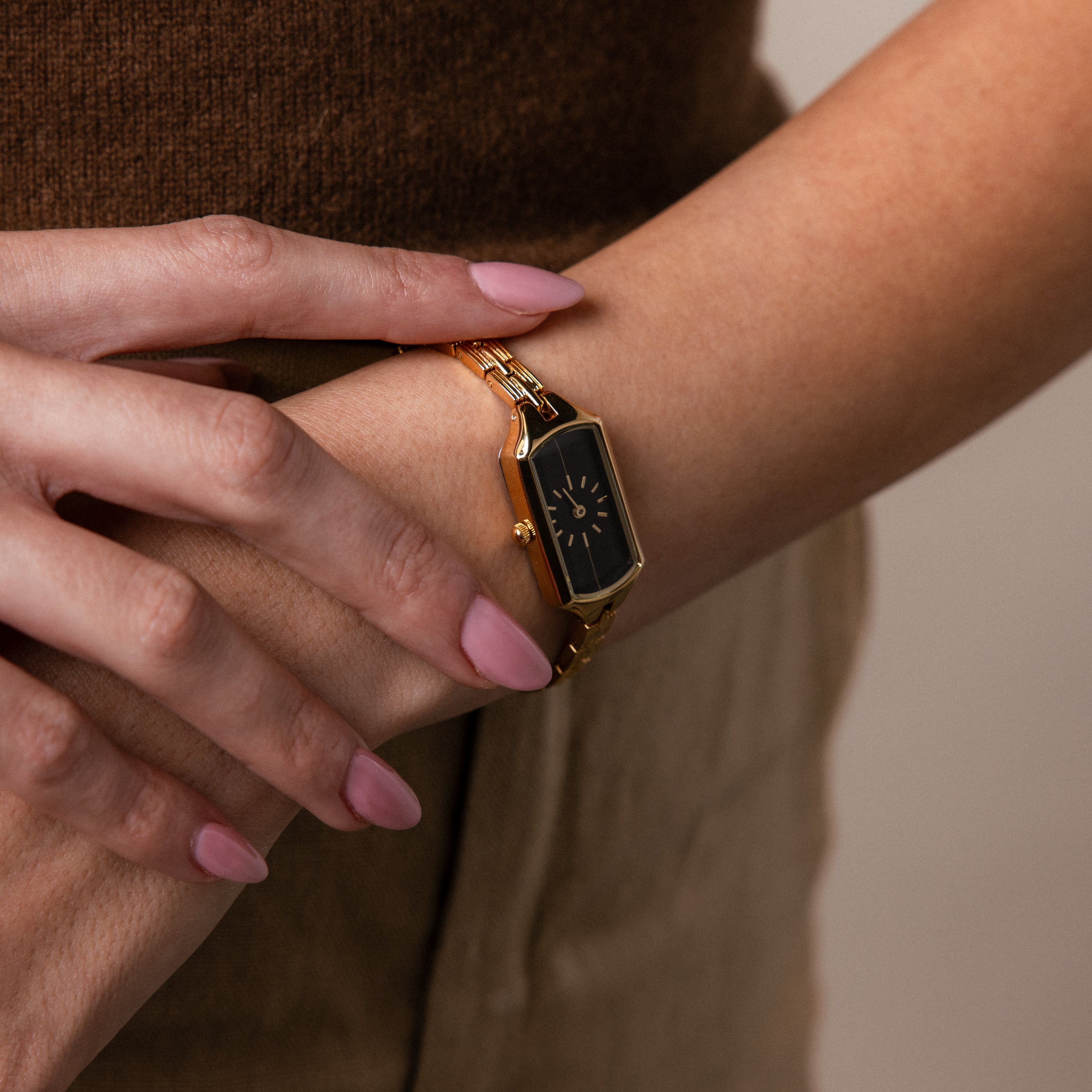 Close up of a model's wrist wearing our Midnight Link Timepiece watch