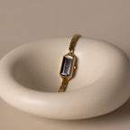 Our Midnight Link Timepiece watch in a ceramaic bowl