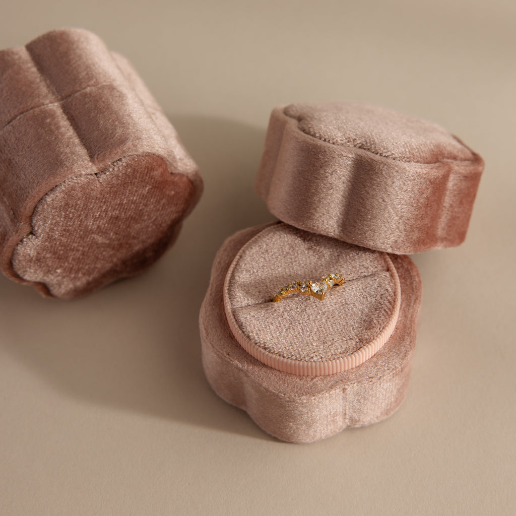A Pink Flower Velvet Ring Box—one open with a gold gemstone ring inside, beside a matching closed box.