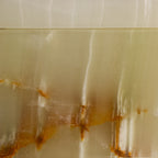 Handcrafted from green onyx with natural vertical and diagonal patterns, this Green Onyx Jewelry Box showcases the unique beauty of genuine stone.