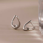 Curved Diamond Teardrop Hoops in Silver