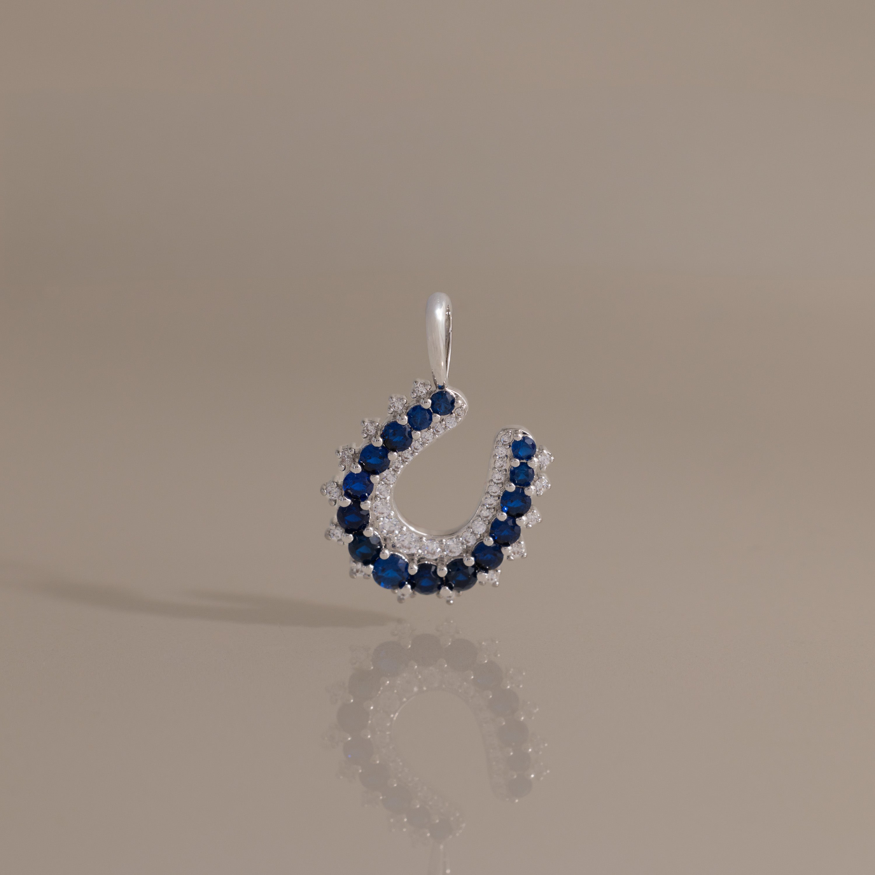 Lucky Sapphire Horseshoe Charm in Silver