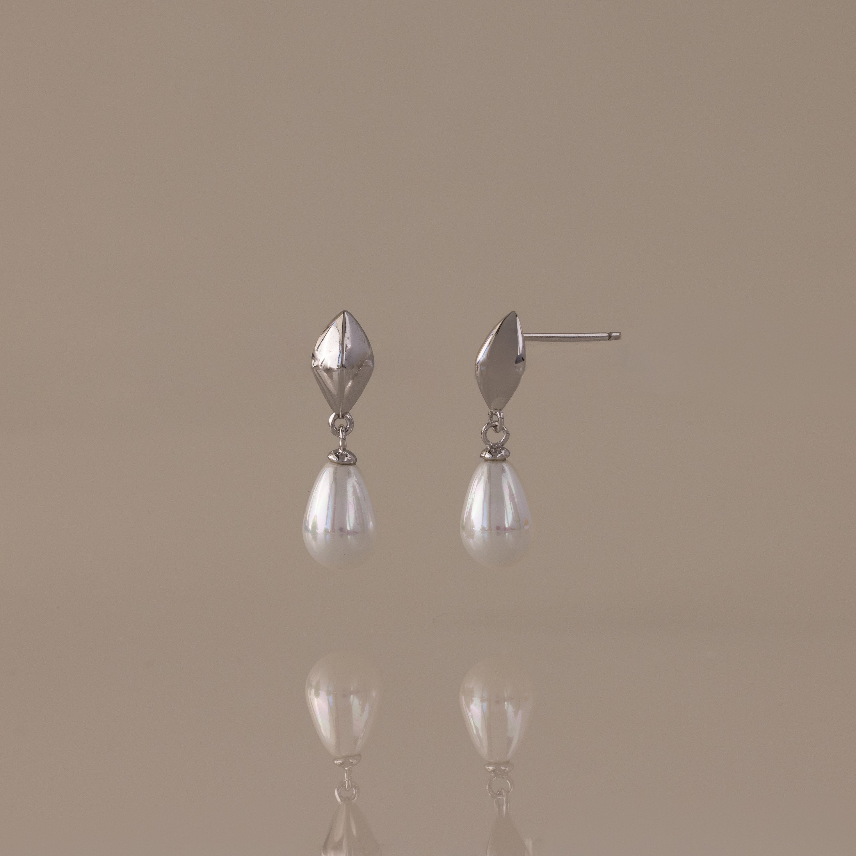 Tiny Pearl Drop Studs in Silver