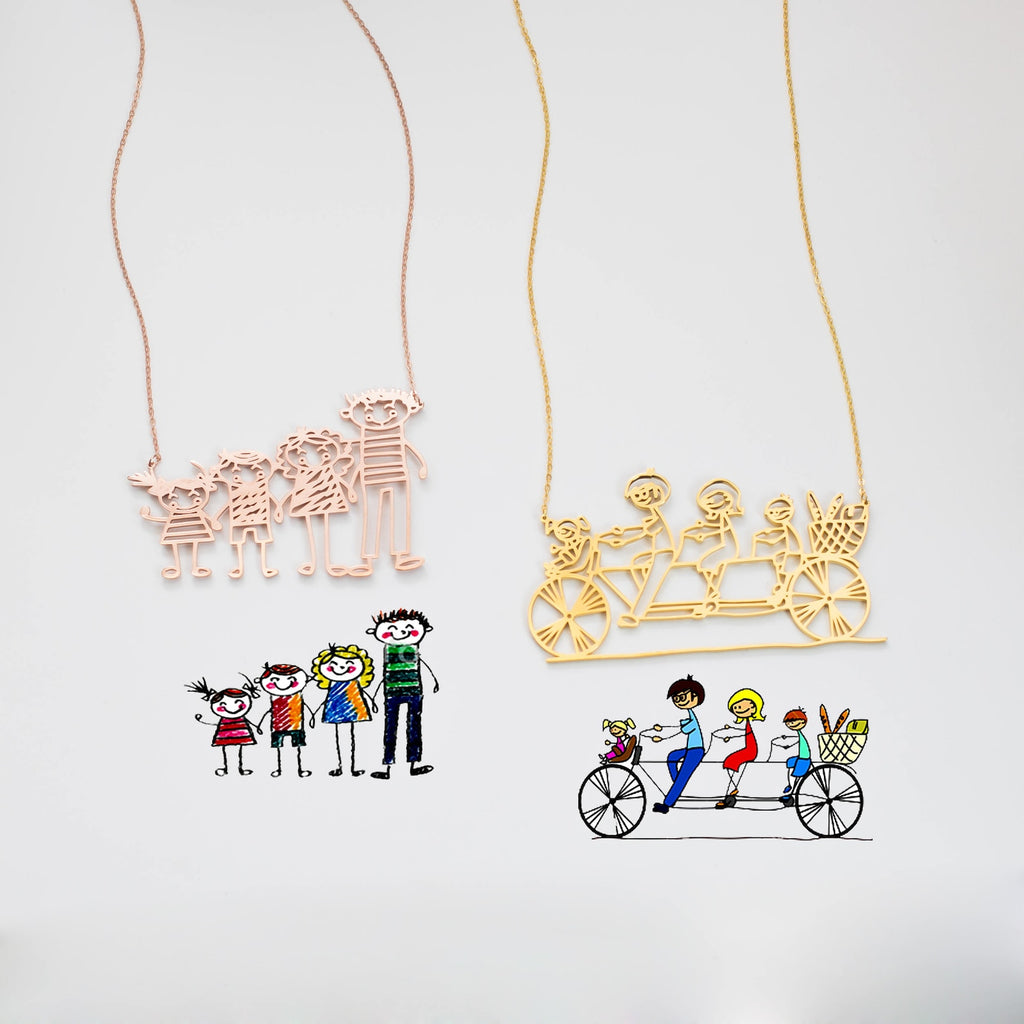 The Kids Drawing Necklace transforms children's crayon sketches—like family portraits or bike rides—into wearable art, with each necklace displayed alongside the custom drawing that inspired it.