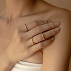 A person with Agate Diamond Rings Set on their fingers rests their hand on their bare shoulder.