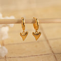 Shark Tooth Huggies feature small, textured shark tooth-shaped pendants—unique Shark Tooth Earrings and a stylish addition to your beach jewelry collection.