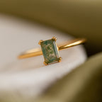 A macro close-up of the Agate Emerald Ring, focusing on the intricate textures and colors within the rectangular gemstone.
