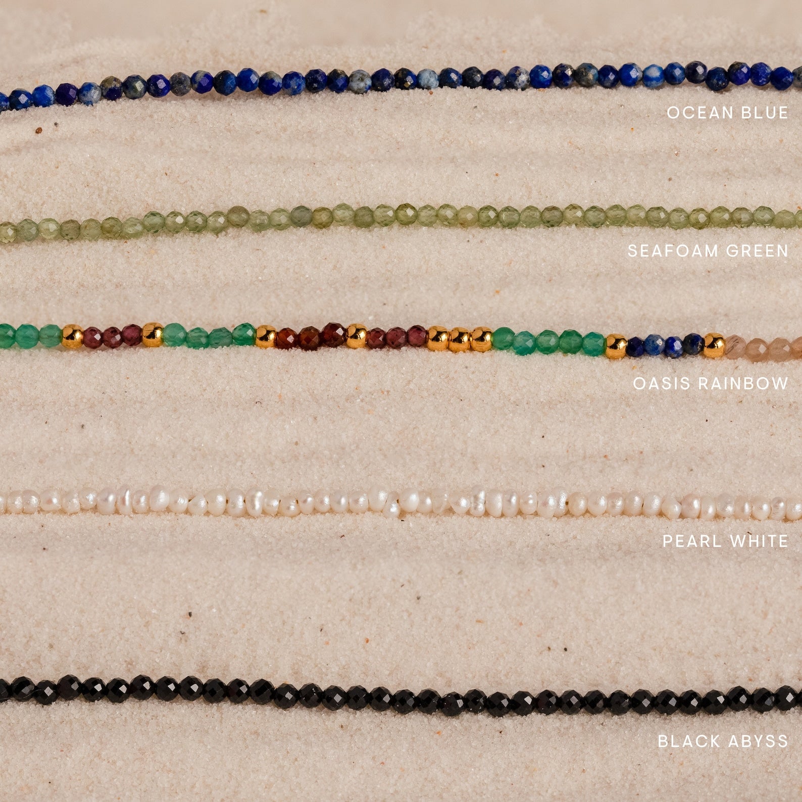Boho Beaded Necklaces in five rows: blue, green, multicolor, white, and black. Perfect for summer outfits or layering to create your unique style. Each row is labeled with its color name.