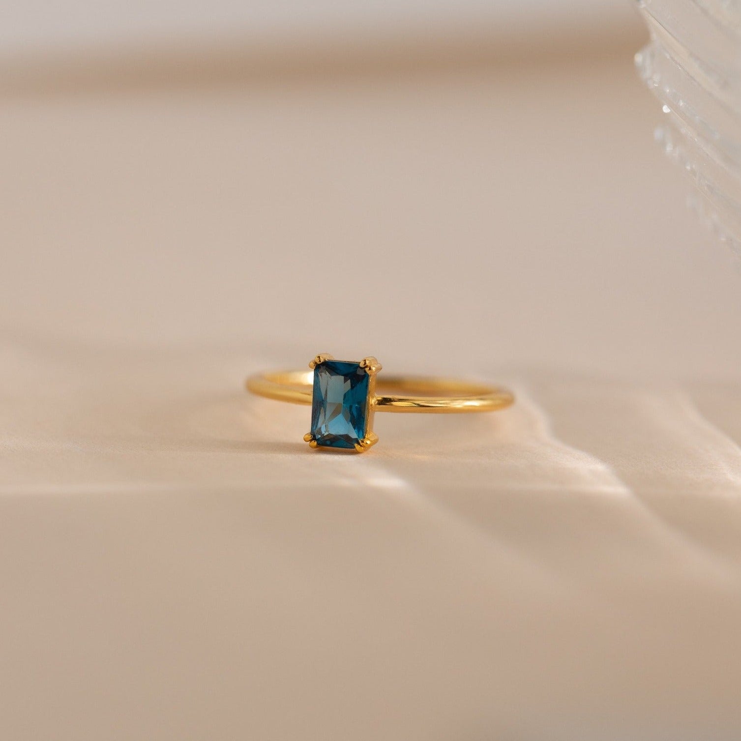 Blue Topaz Emerald Solitaire Ring | Caitlyn Minimalist