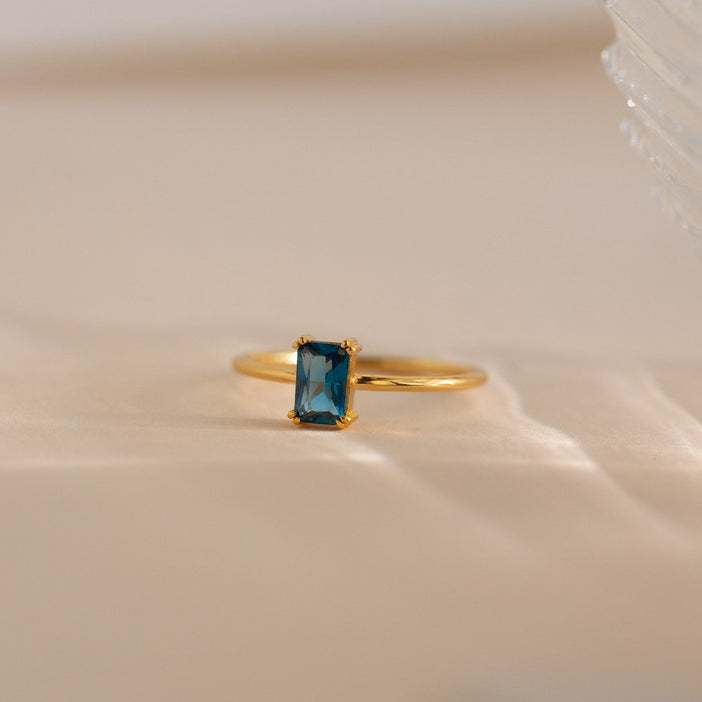 Blue Topaz Emerald Ring