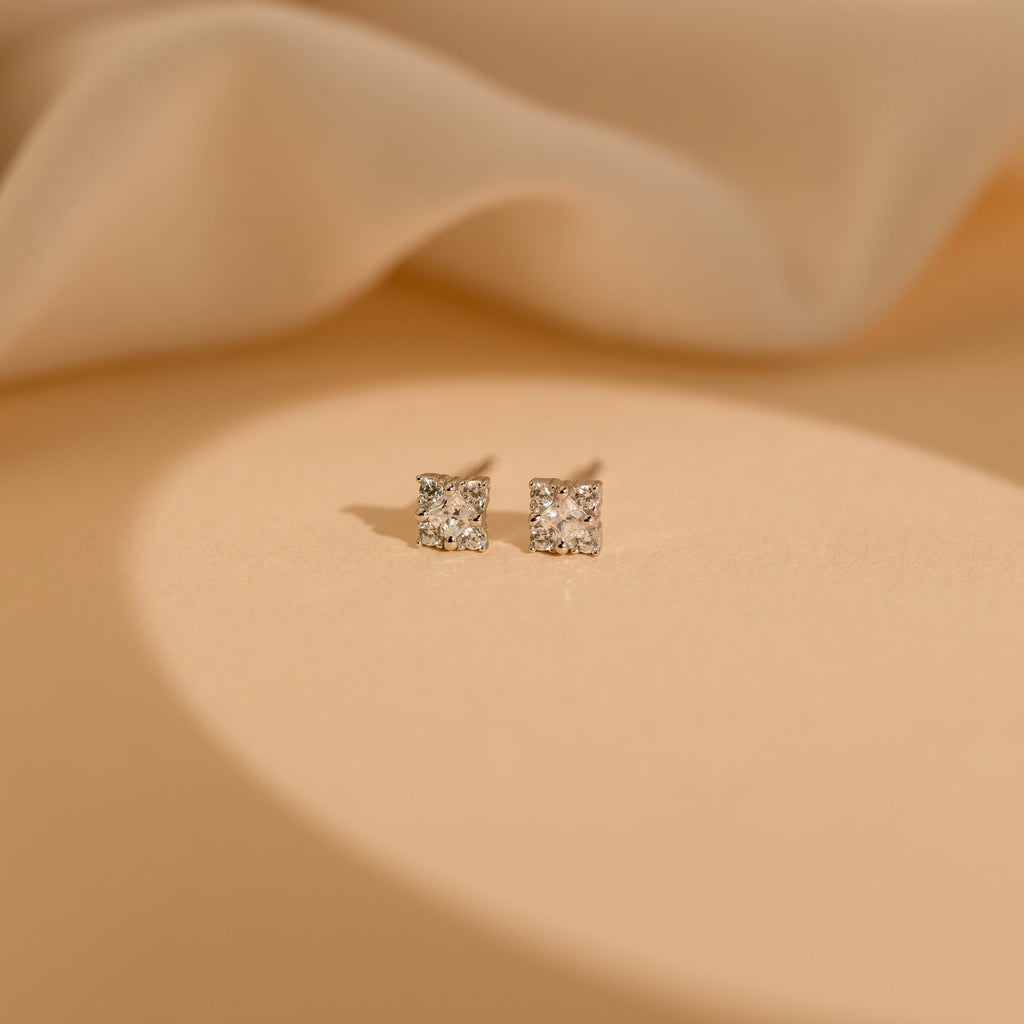 Daydreamer Diamond Studs are glamorous earrings that add a touch of elegance to any look.