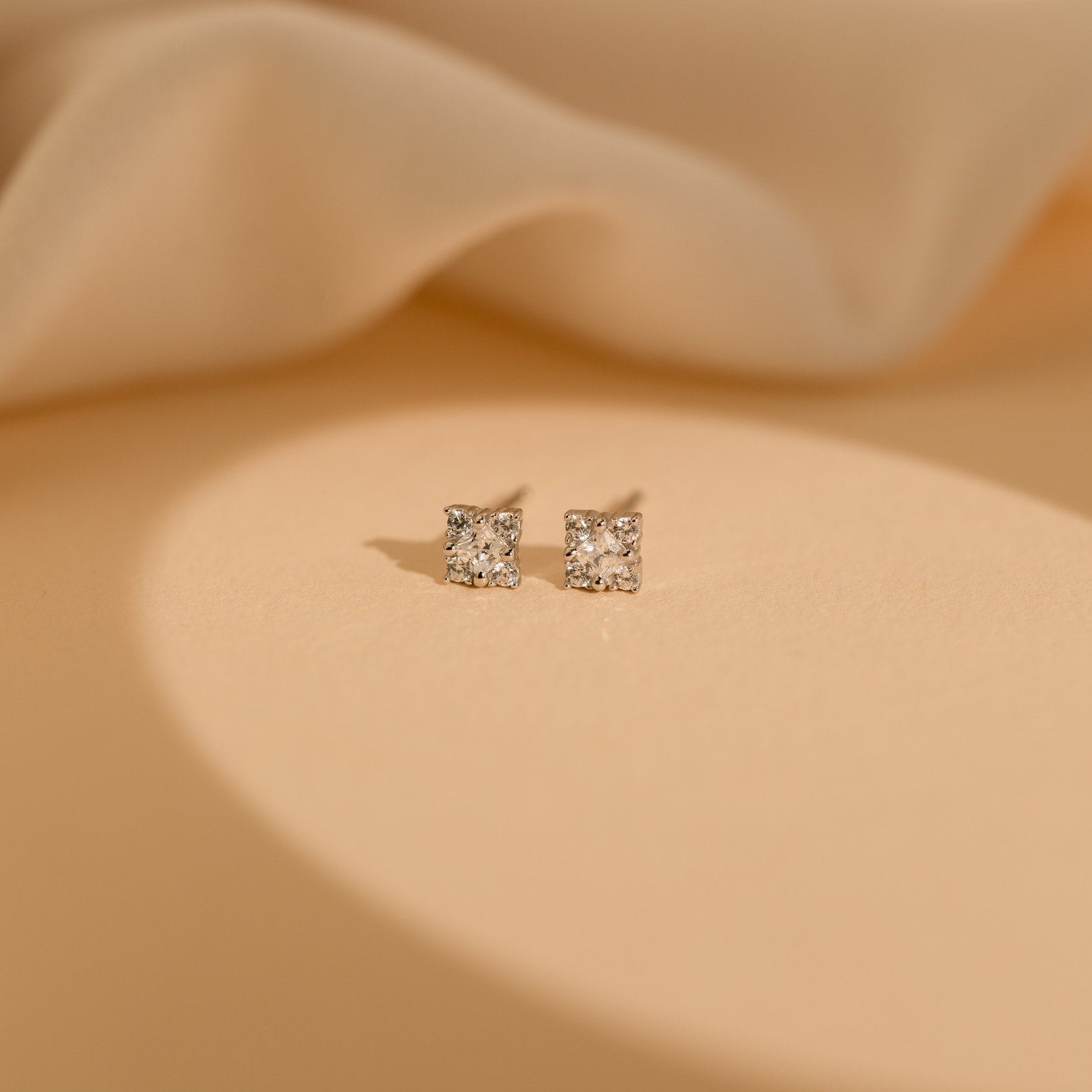 Daydreamer Diamond Studs are glamorous earrings that add a touch of elegance to any look.
