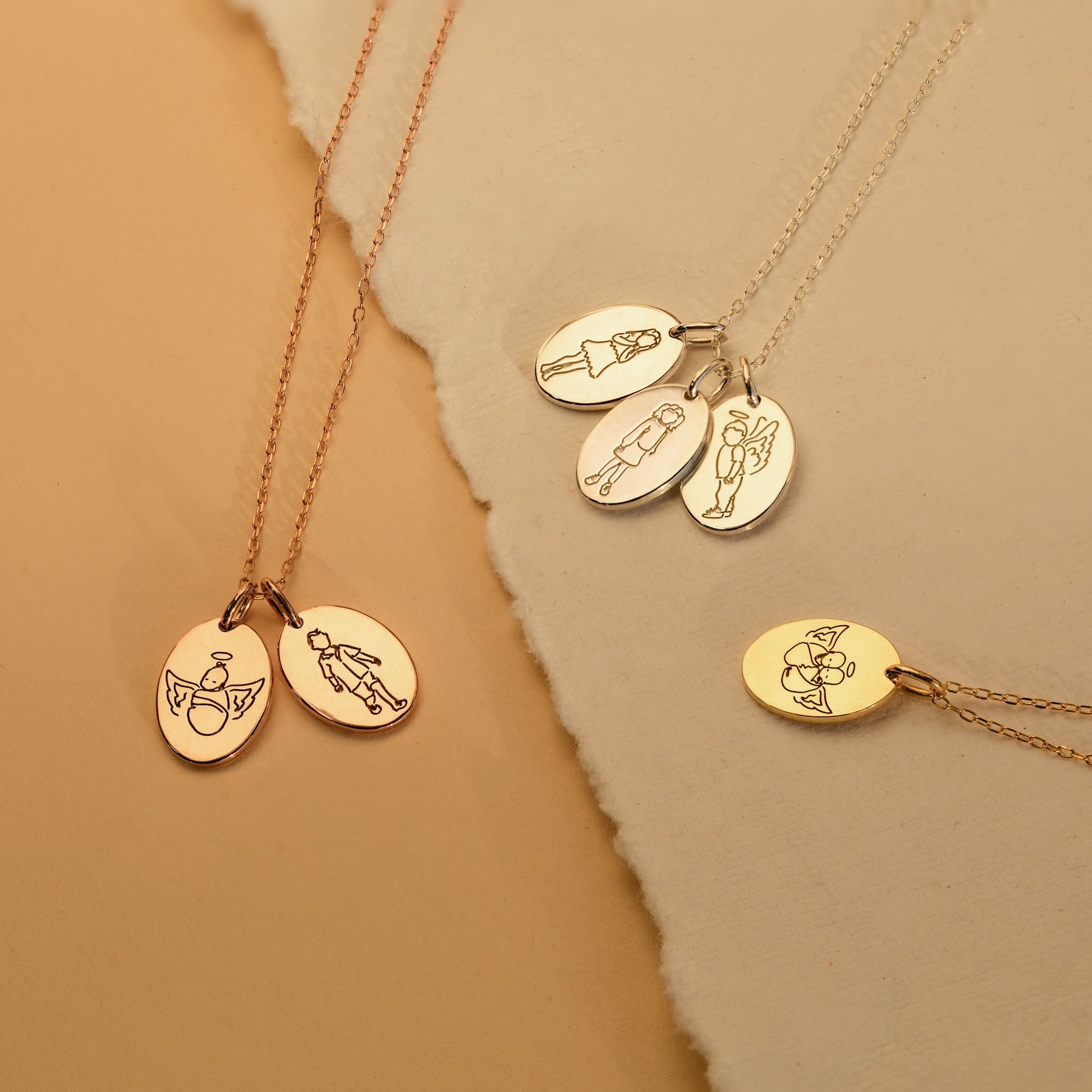The Child Portrait Necklace features four gold and rose gold engraved oval pendants with angel and figure designs, making each piece a meaningful keepsake or thoughtful memorial necklace.