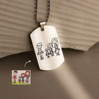 The Men's Dog Tag Necklace engraved with a child’s drawing of a family of four holding hands makes an unforgettable Father’s Day gift.