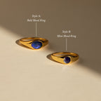 A gold Mini Mood Ring on a beige background with soft lighting—an ideal stacking ring for a minimalist look.
