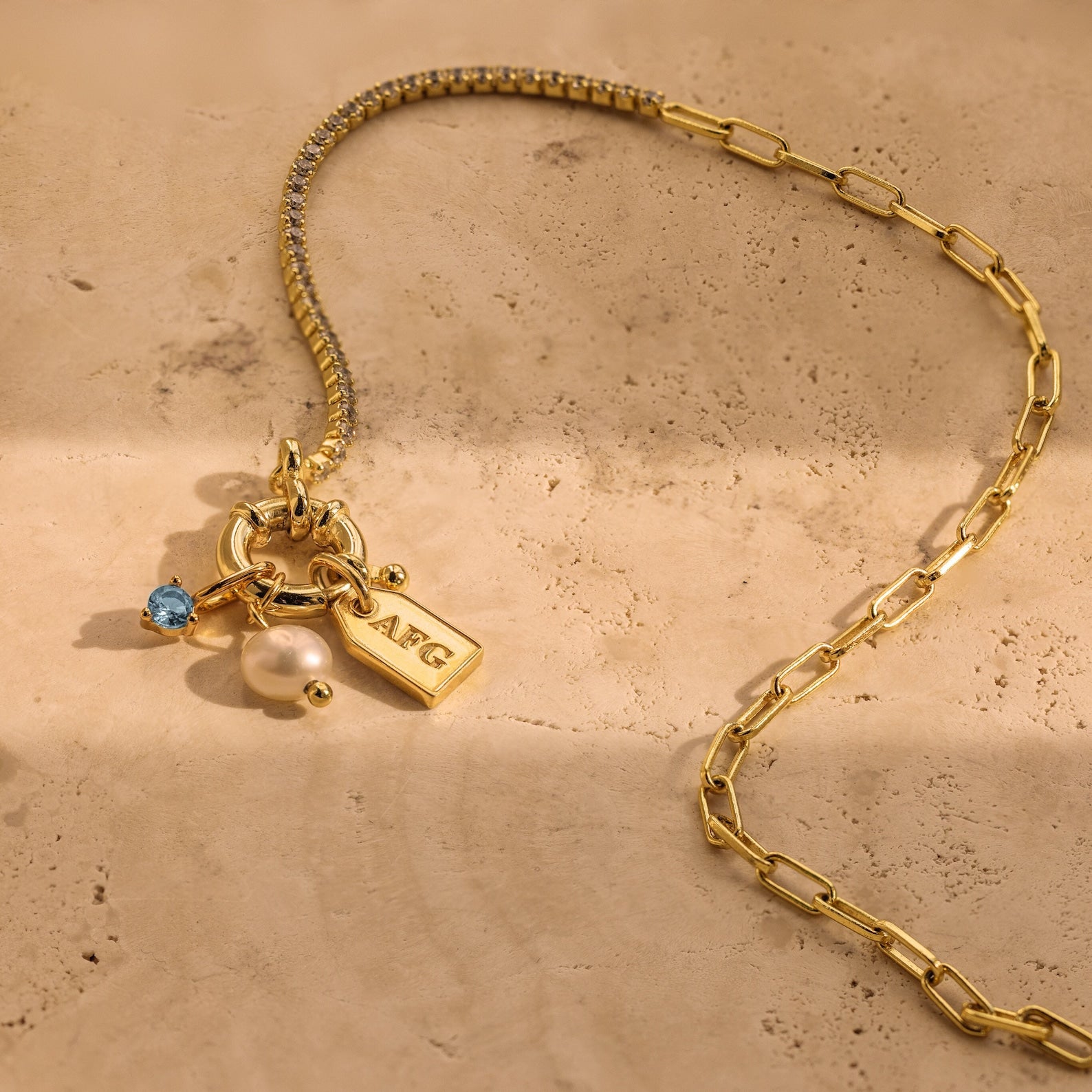 Dainty Blue Zircon Charm