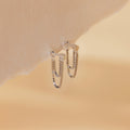 Flatback Chain Earrings shown on a soft beige textured background—ideal minimalist earrings to elevate your next earring stack.