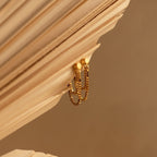Flatback Chain Earrings draped over angled, light-colored wooden slats with a soft brown background—perfect for creating an elegant, minimalist earring stack.