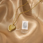 Fingerprint Heart Necklace shown on satin, labeled "Your Actual Fingerprint" with an arrow—makes a meaningful Mother's Day or memorial gift.