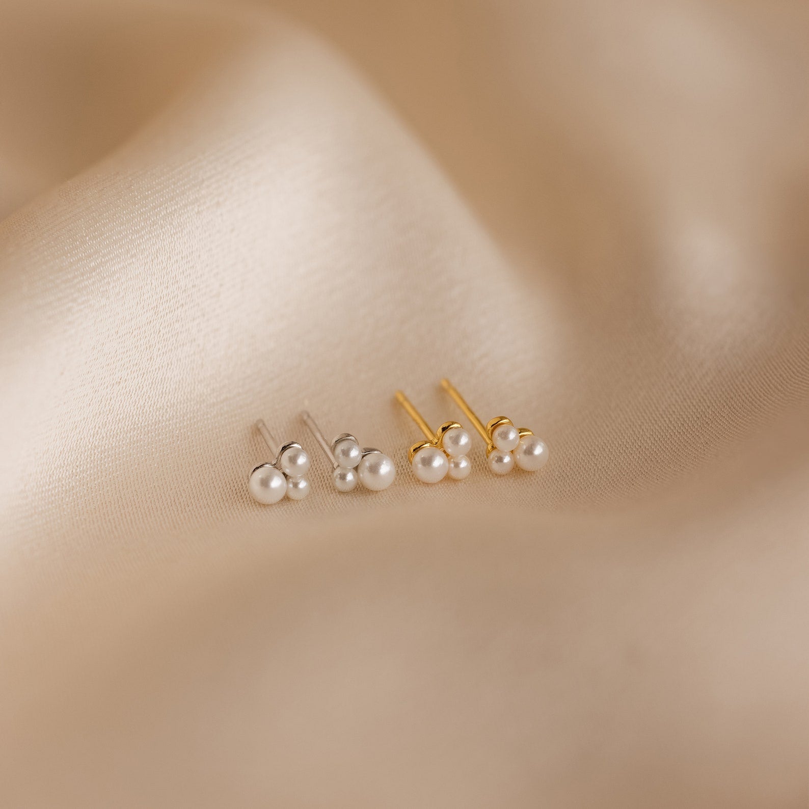 The Trio Cluster Pearl Studs are elegant pearl earrings, perfect for brides or as timeless wedding jewelry.