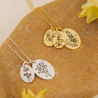 Add-On Listing: Gold and silver necklaces with engraved floral pendants, ideal for personalization or custom orders, shown on a brown stone surface.