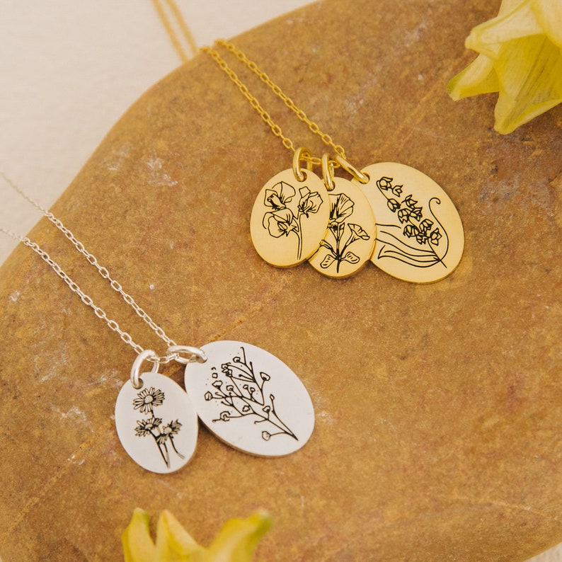 Add-On Listing: Gold and silver necklaces with engraved floral pendants, ideal for personalization or custom orders, shown on a brown stone surface.