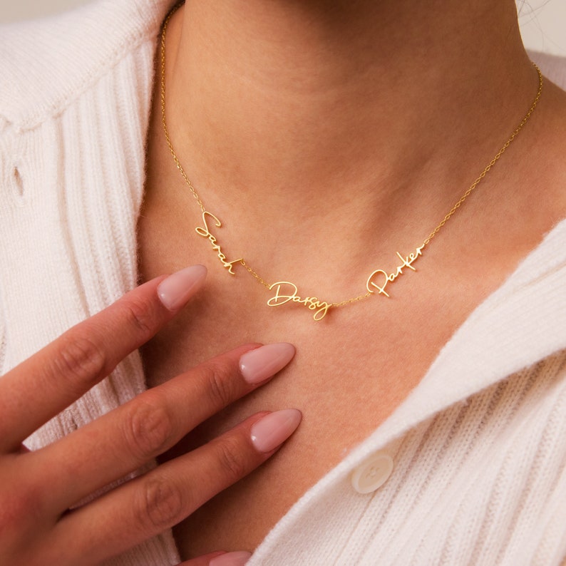 Add-On Listing: Gold necklace shown with 'Sarah Daisy Parker' in script, worn by someone in a white sweater. Personalize this piece—custom names available to make it yours or add as a special gift.