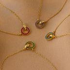 The Interlocking Birthstone Bracelet features colorful, gem-encrusted links—perfect for those who love birthstone jewelry and want to add a personal touch to their style.