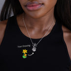 Woman wearing a Kids Drawing Necklace with a flower pendant, inspired by a colorful children's artwork—unique wearable art and the perfect personalized gift.