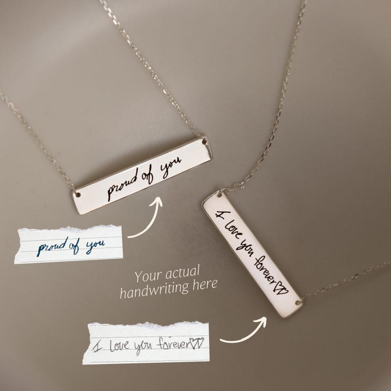 Two Handwriting Bar Necklaces in Sterling Silver, engraved with handwritten messages “proud of you” and “I love you forever,” make a heartfelt and timeless personalized jewelry gift.