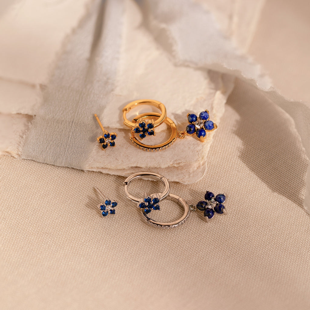 The Sapphire Flower Earrings Set - Silver makes a beautiful anniversary gift and adds a touch of elegance to any outfit.
