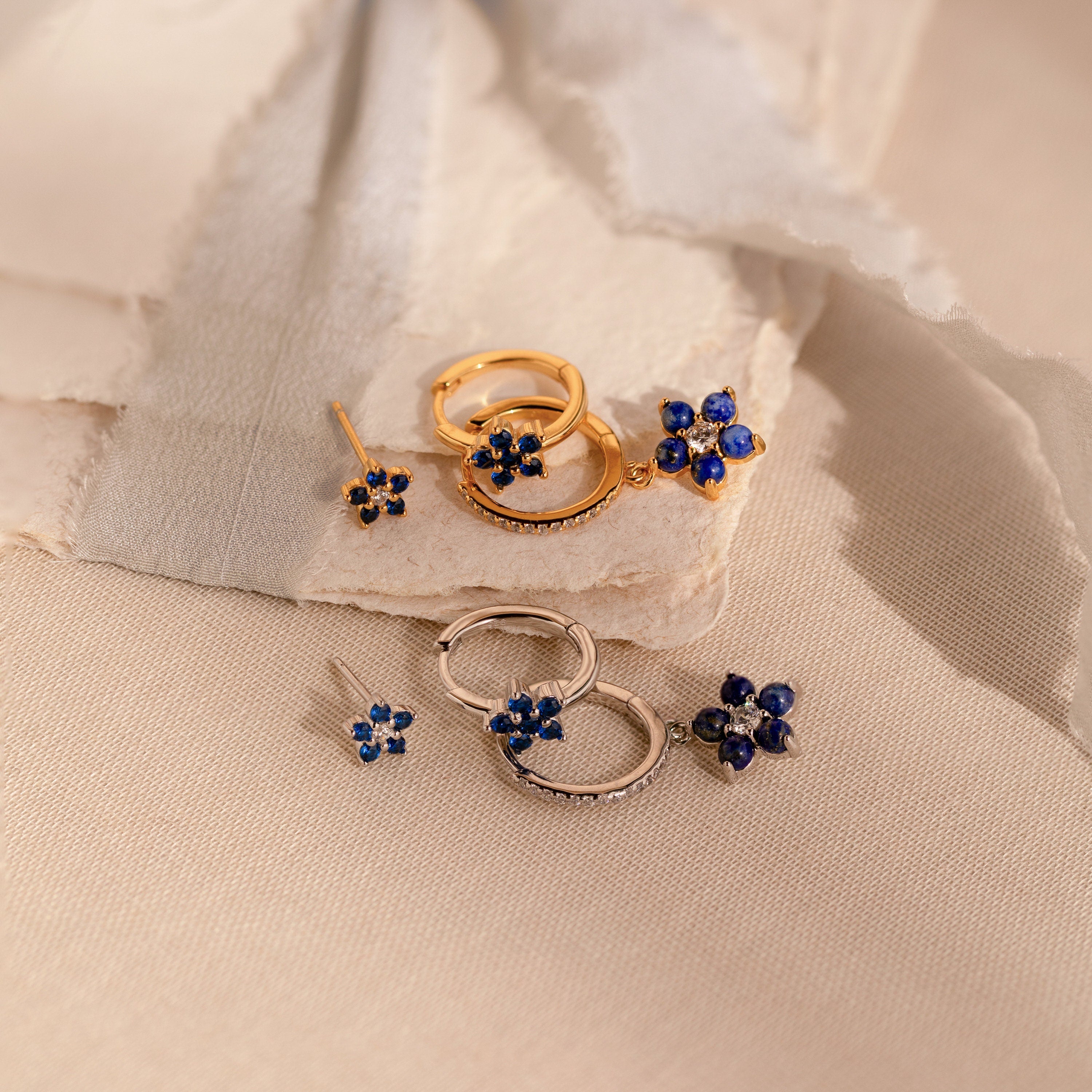 The Sapphire Flower Earrings Set - Silver makes a beautiful anniversary gift and adds a touch of elegance to any outfit.