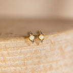Opal and Diamond Studs: elegant cartilage earrings with opal and diamond stones, perfect for helix piercings.
