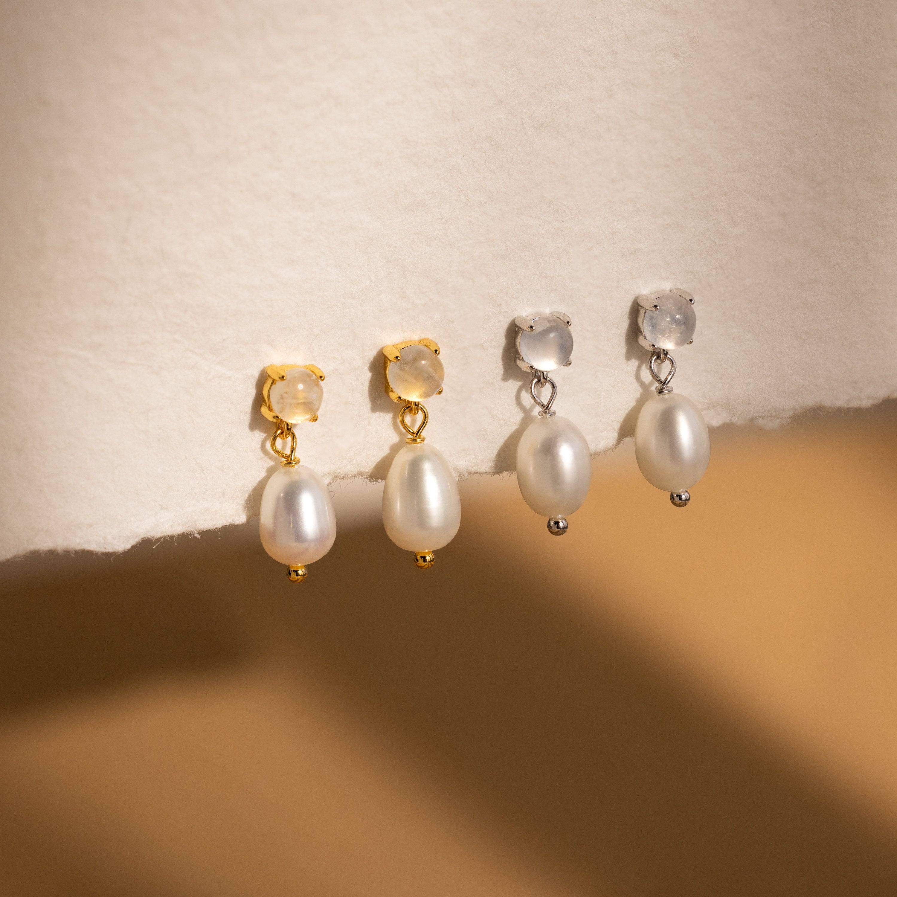 The Moonstone Pearl Drop Earrings are elegant accessories, perfect for elevating any jewelry collection.