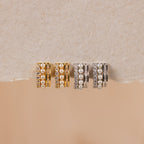 The Diamond Pearl Stacked Hoops feature elegant pearls and diamonds, making them perfect bridal jewelry for a timeless, romantic look.