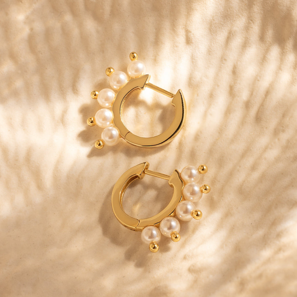 Beaded Pearl Huggies, these gold earrings blend modern style with timeless elegance, showcasing the beauty of pearl jewelry.