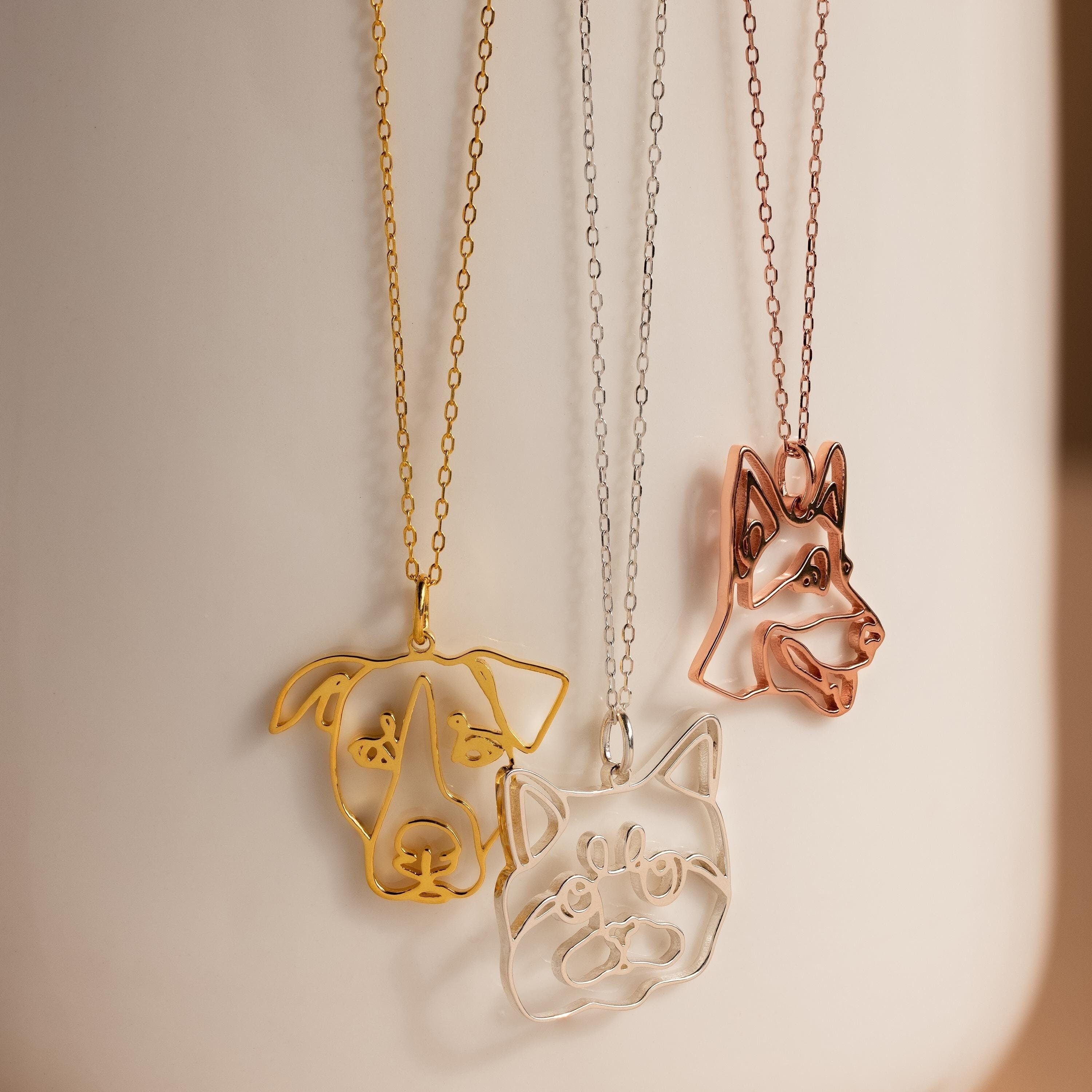 The Custom Pet Line Art Necklace features wire pendants shaped like a dog, cat, or husky face—perfect personalized jewelry for animal lovers.