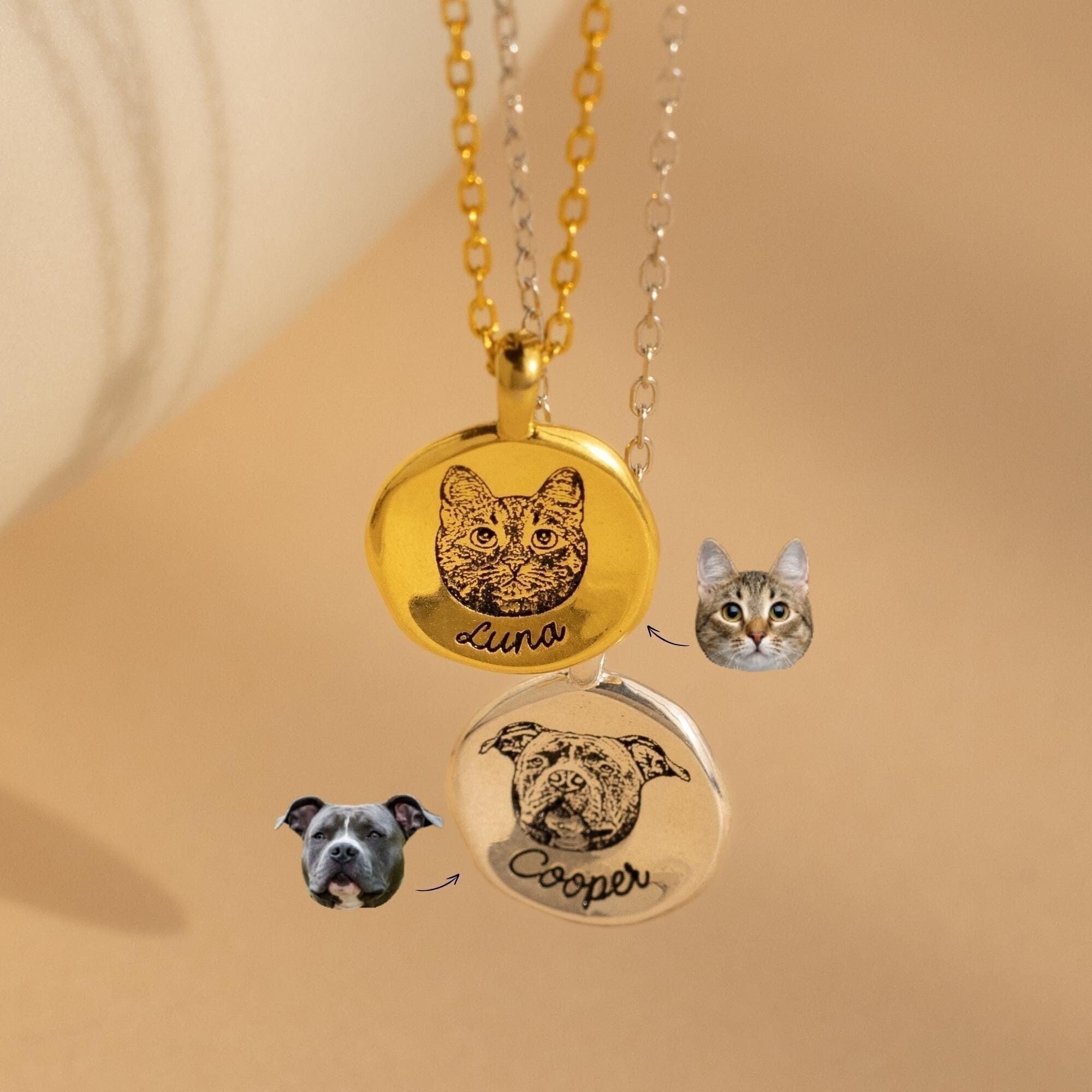 Two Pet Portrait Coin Necklaces: one gold with a cat labeled Luna, one silver with a dog labeled Cooper. Ideal as custom pet necklaces or meaningful pet memorial jewelry.
