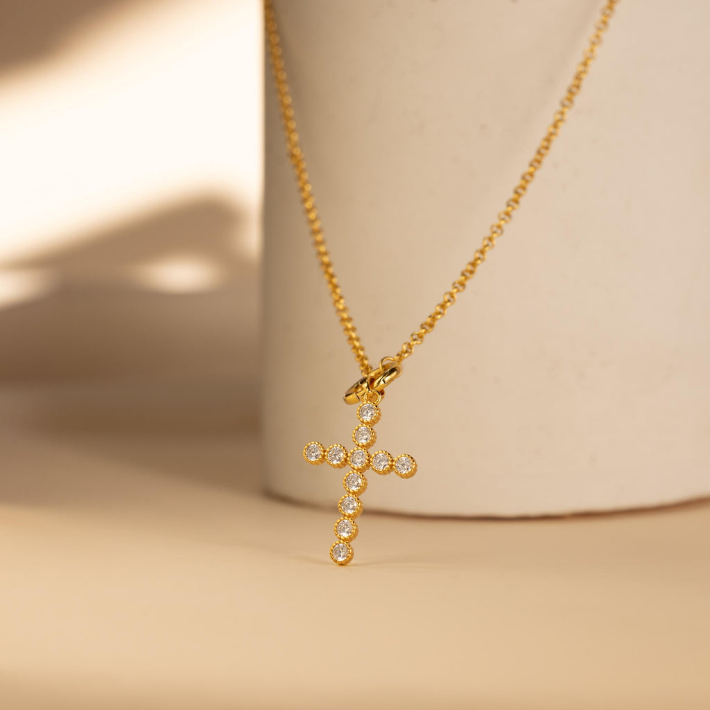 Gold Pave Cross Charm dangles from a Rolo Circle Necklace