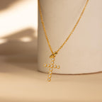 Gold Pave Cross Charm dangles from a Rolo Circle Necklace