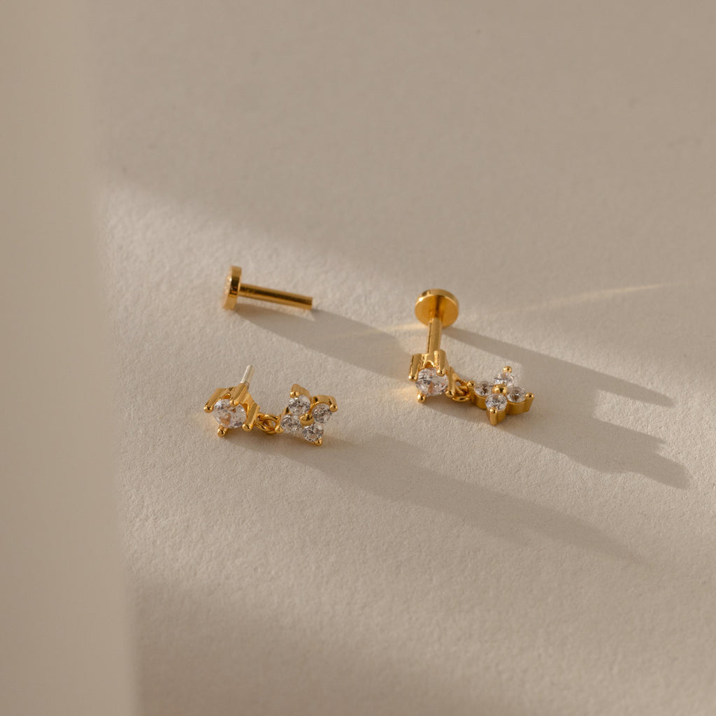 Ivy Flower Flat Back Studs with clear gemstones displayed on a soft beige surface in natural light—an ideal Mother’s Day gift.