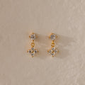 Ivy Flower Flat Back Studs feature small, clear gemstones in a floral design on a textured beige surface—an ideal, thoughtful Mother’s Day gift.