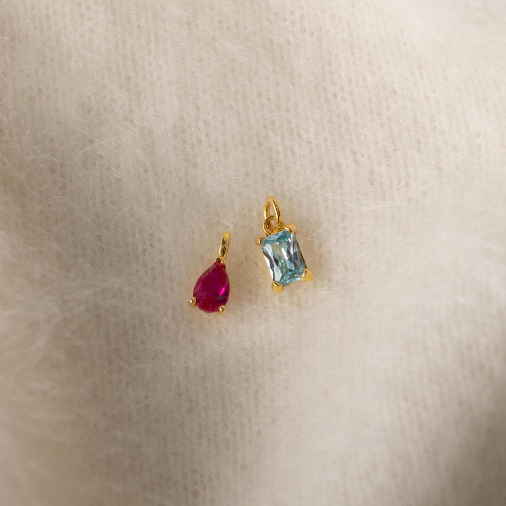 6mm Ruby Pear-cut Birthstone Charm and 6mm Aquamarine Baguette-cut Birthstone Charm with jump rings