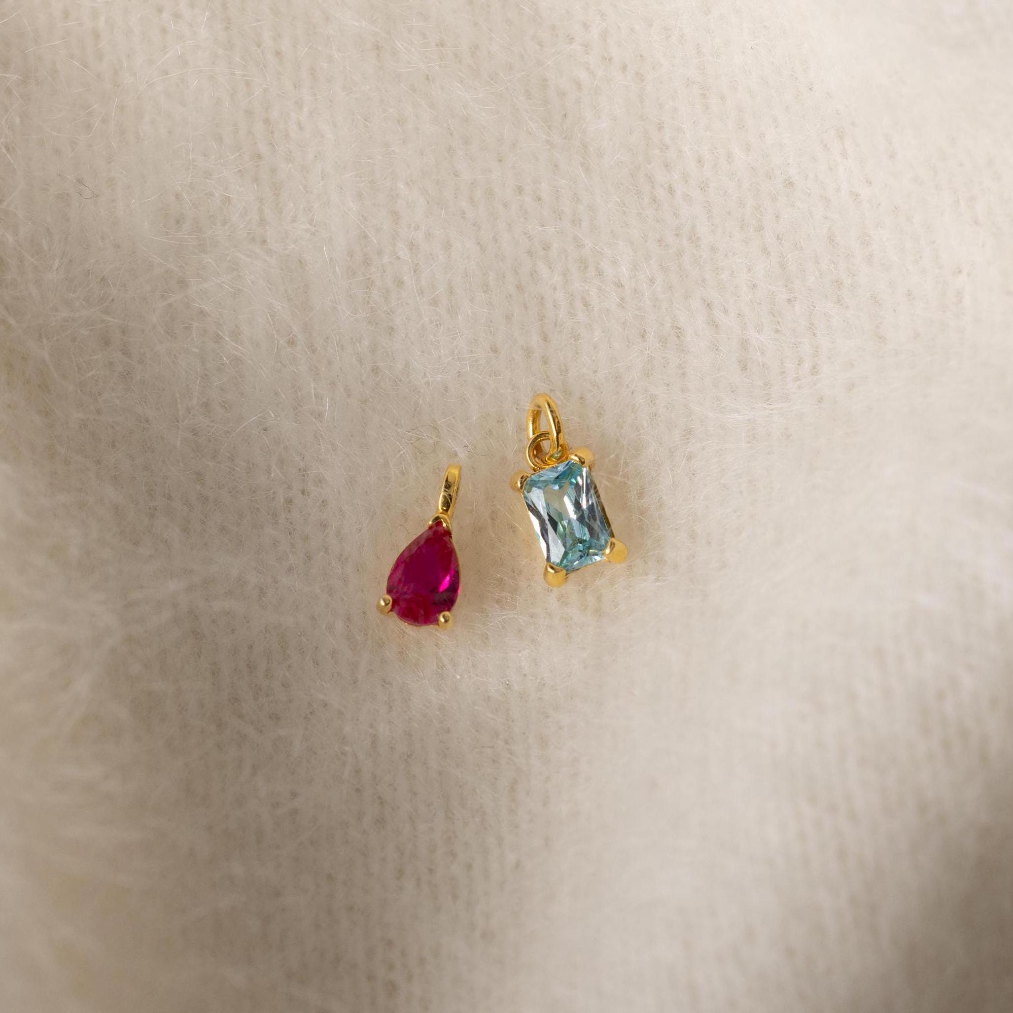 6mm Ruby Pear-cut Birthstone Charm and 6mm Aquamarine Baguette-cut Birthstone Charm with jump rings