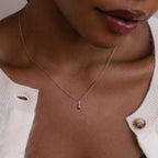 Model wearing silver cable chain with Dainty Duo Birthstone Charm