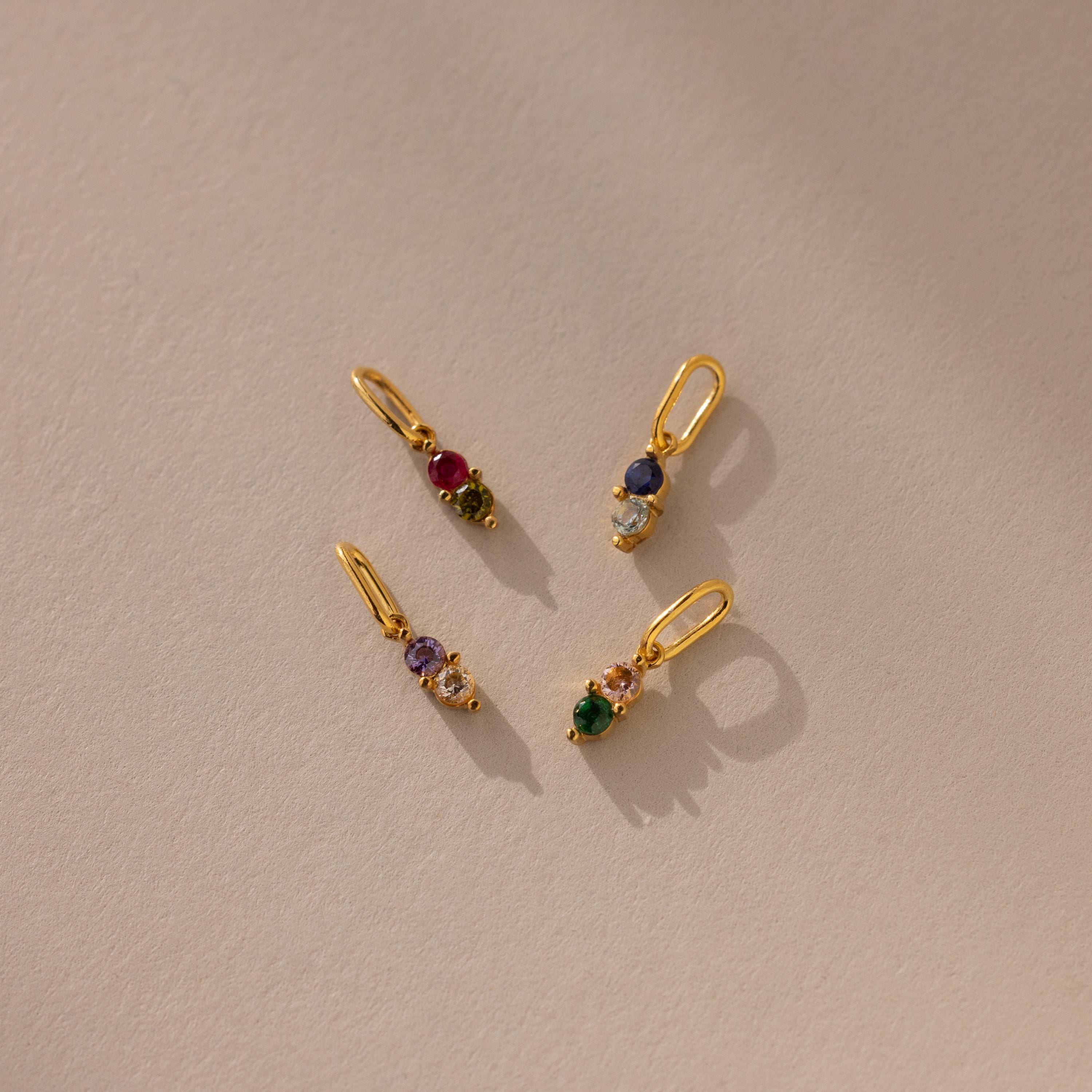 Four gold dainty Duo Birthstone Charm with different birthstone colors 